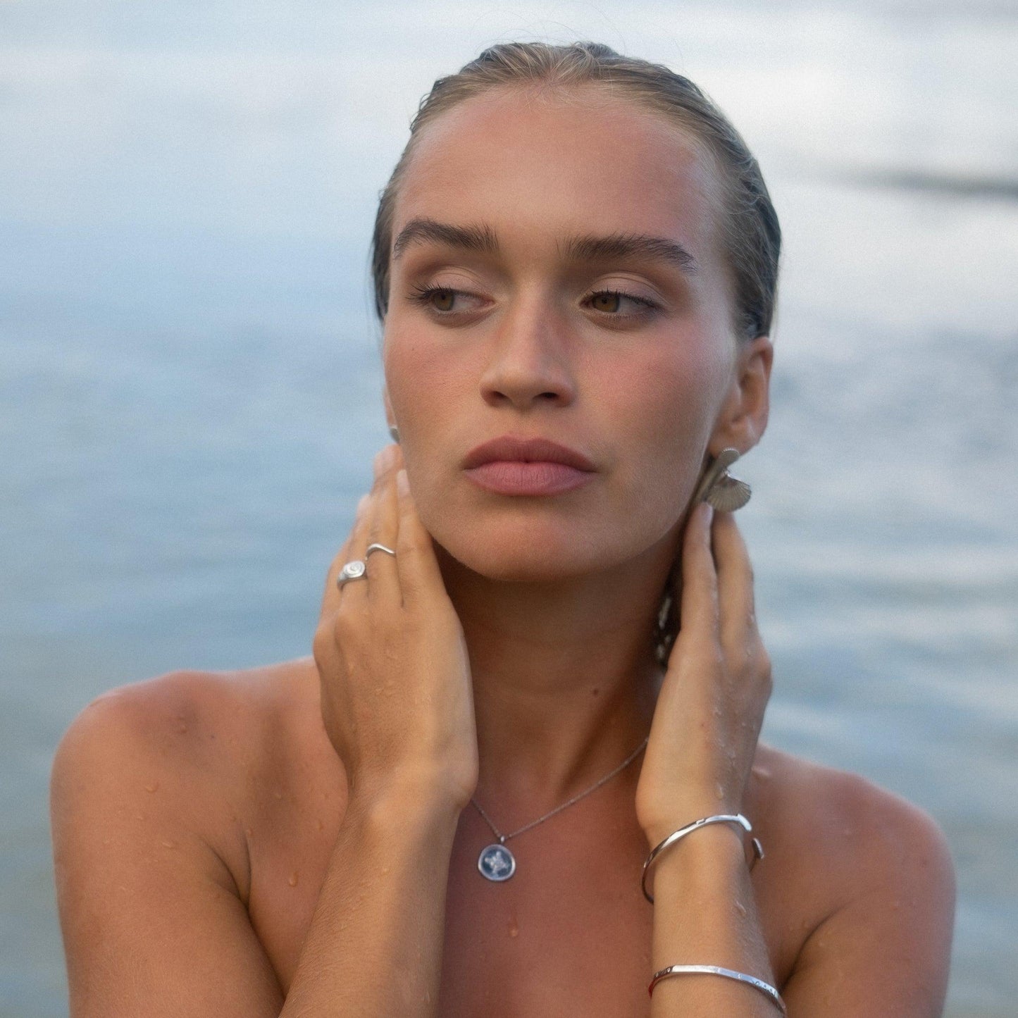 Muslingehemmelighed Øreringe