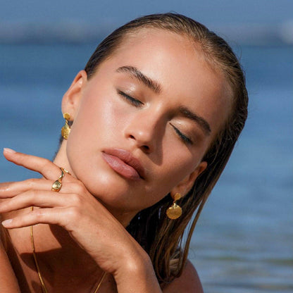 Muslingehemmelighed Øreringe